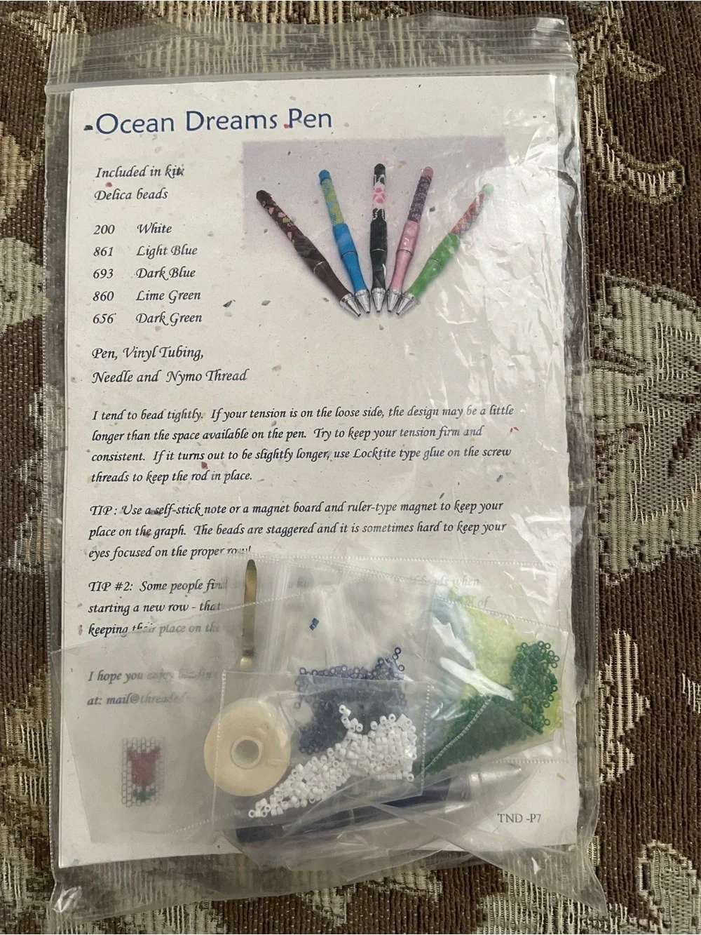 Threaded Needle Designs 